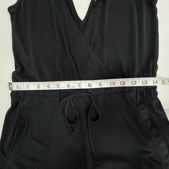 Forever 21 Black Jersey Jumsuit Low V Size S.
Lightweight, soft & comfortable - Picture 8 of 10